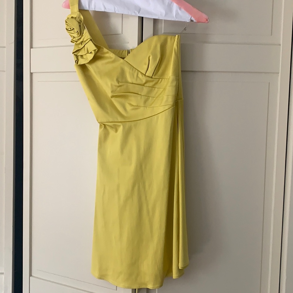 Mustard yellow one strap dress.